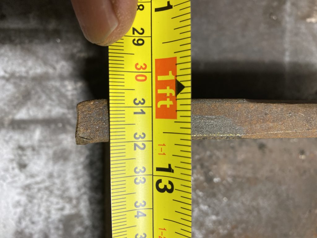 Inside precise measurement of 30 cm and 8 mm while pushing down on them metric side of tape measure and pushing down the tape towards the hook. Pushing the tape towards the hook and pushing the metric side is rather difficult and it could be inaccurate. JW Investrade Inc. for metalgrating.ca 2023 London, Ontario