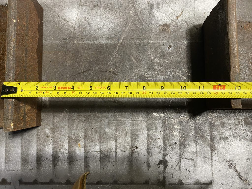 While doing the outside measurement the tape measure is nicely hooked up on the outside of the leg and stretches passed the other leg. To get the measurement of the gap we will have to deduct thicknessed of both legs. .JW Investrade Inc for metalgrating.ca 2023 London Ontario