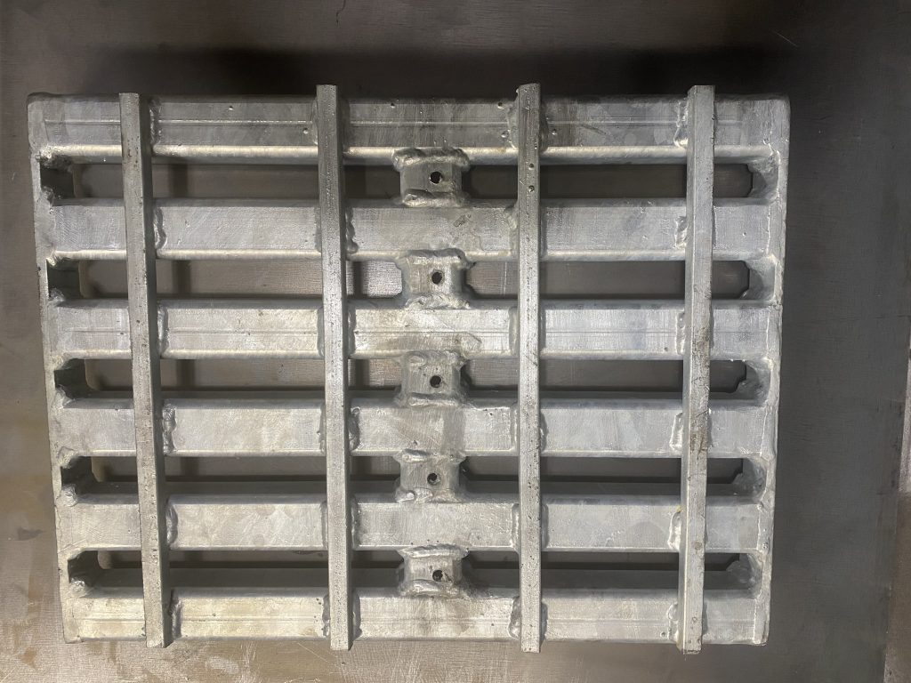 We are using 2 x 2 x 0.250 hollow square tubes, bearing tubes, as a main structural element for building our steel metal grating weldment panel due to their grater resistance to impact and load damages in comparison to 2 x 1/4 inch bearing bars. of the same size. The short spacer tubes, cross tubes, are drilled for internal wall galvanization. The square solid steel cross bars additionally improve the load resistance. JW Investrade Inc. for metalgrating.ca 2023, London, Ontario.