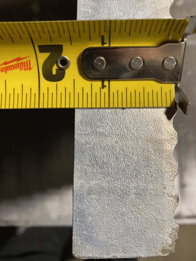 The bearing bar depth is the thickness of grating steel panel and in this case the depth is 1.5 inch as shown on the tape measure. JW Investrade Inc for metalgrating.ca 2024 London Ontario