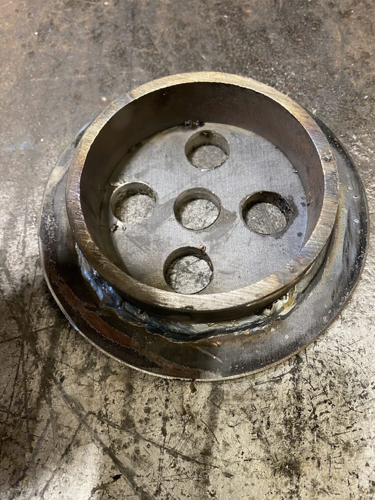 Upside down circular cover with drain channel of 2" long that can easily engage into draining pipe. For JW Investrade Inc. www.metalgrating.ca, London, Ontario, 2024