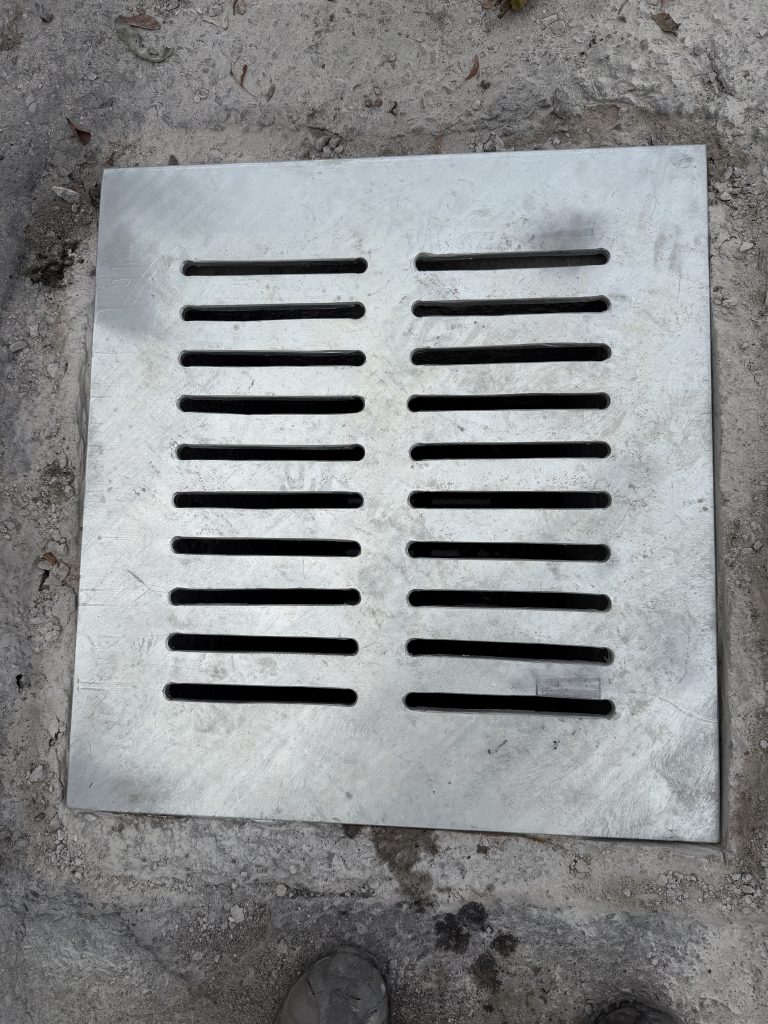 Installed unsupported style custom basin lid that is sunk in to the concrete. In this way we prohibit the horizontal movement of the lid. For JW Investrade Inc. , www.metalgrating.ca, London, Ontario, 2026.